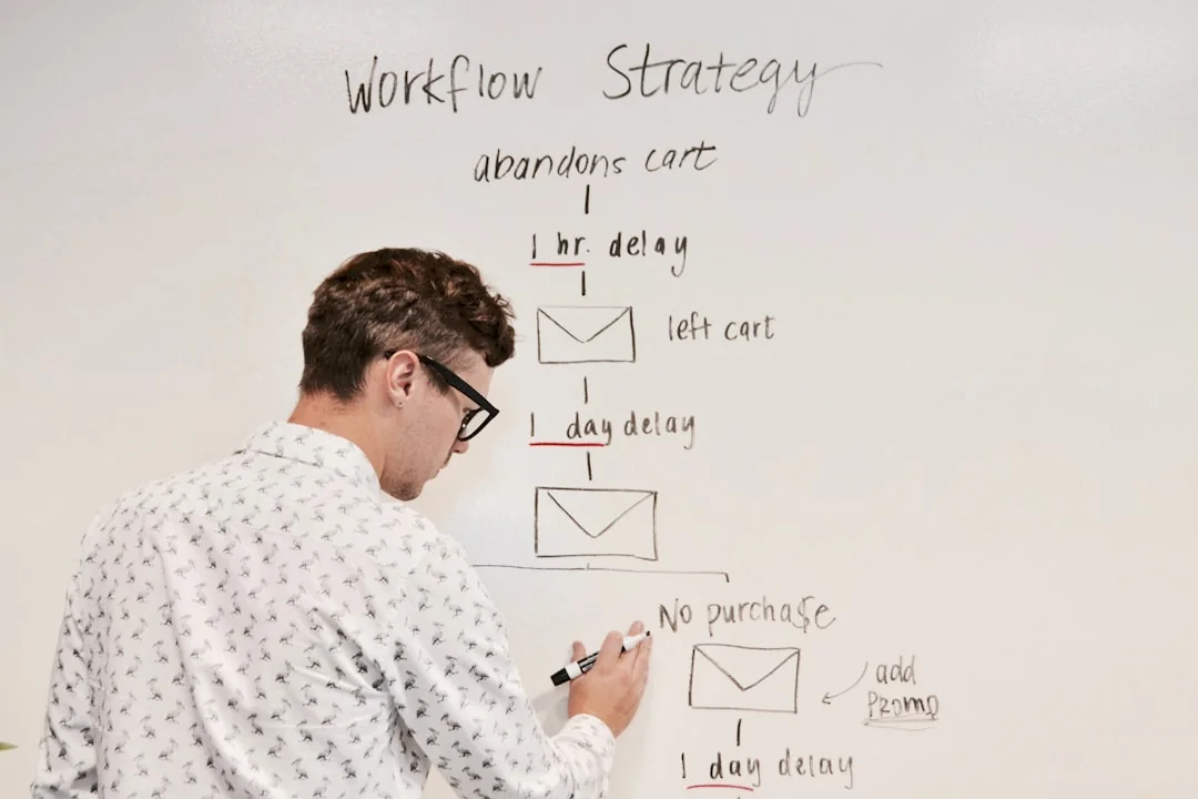 Magnifying glass and colored pencils on financial trend graphs highlighting sales growth.